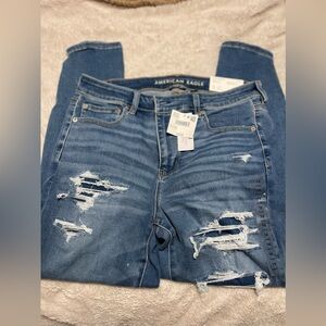 AE BNWT next level stretch size 14 short